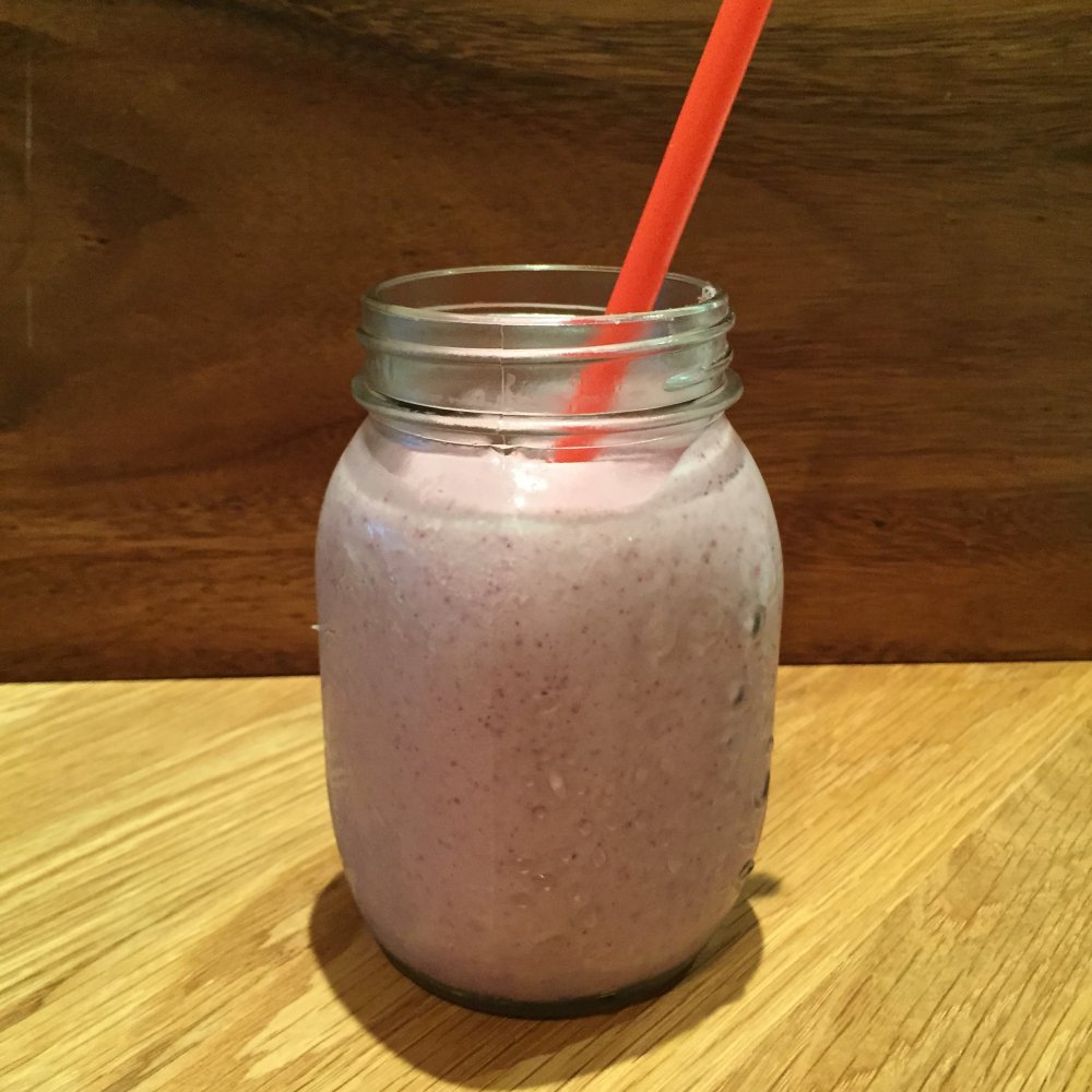 Ground Kush in Round Container with Hemp Leaves