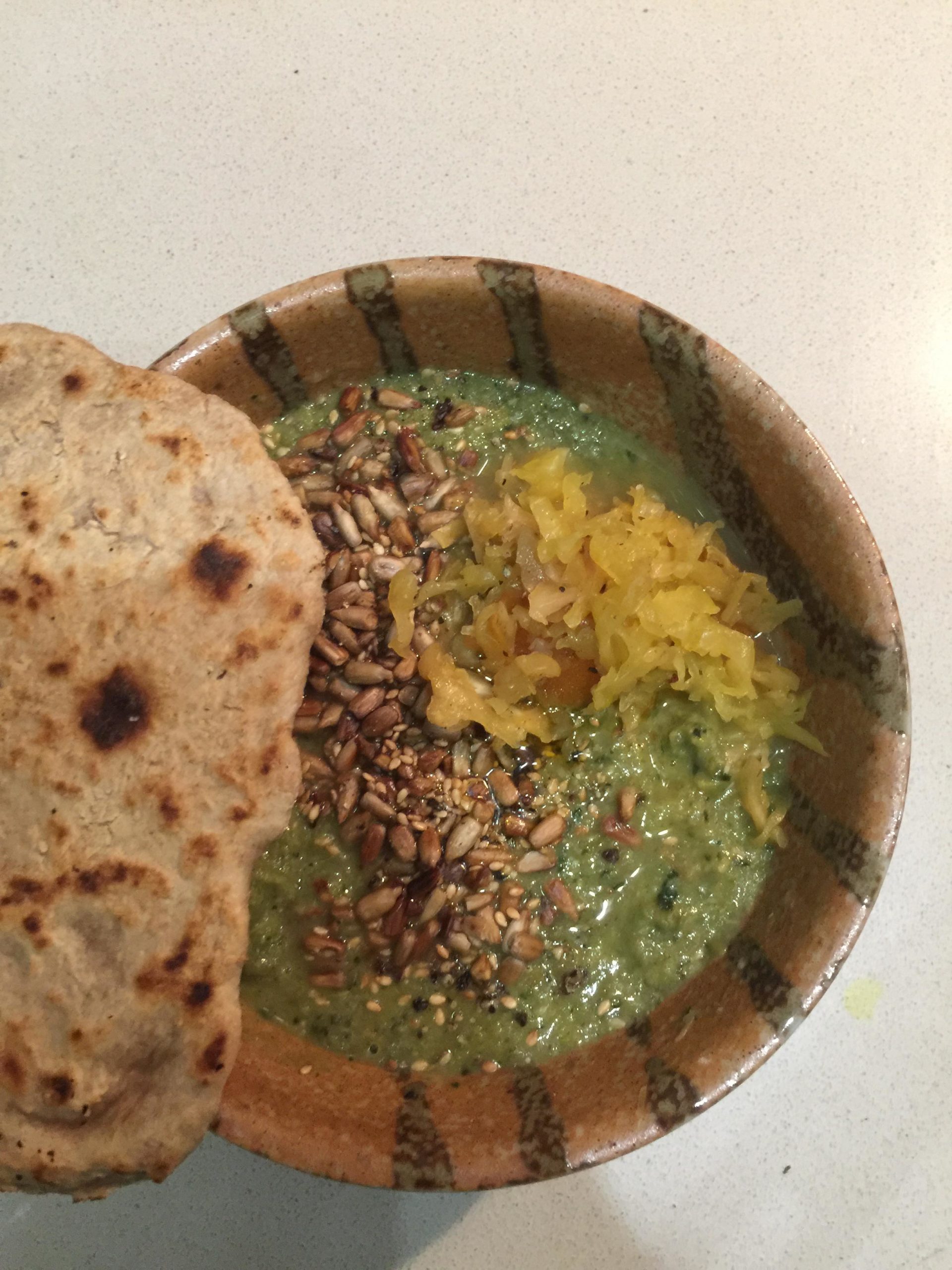 Ground Kush in Round Container with Hemp Leaves