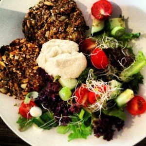 Ground Kush in Round Container with Hemp Leaves