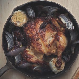 Ground Kush in Round Container with Hemp Leaves